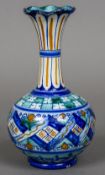 A Cantagalli Iznik pattern vase With flared neck and bulbous main body. 18.5 cm high.