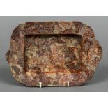 A late 19th century Chinese carved soapstone dish Of rounded rectangular form,