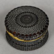 An 18th century pressed tortoiseshell yellow metal mounted snuff box Of circular form,