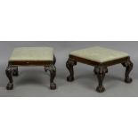 A pair of late 19th/early 20th century mahogany framed stools The overstuffed drop-in seats above