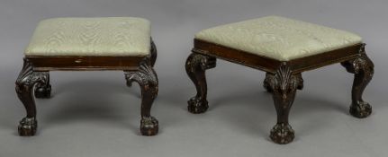 A pair of late 19th/early 20th century mahogany framed stools The overstuffed drop-in seats above