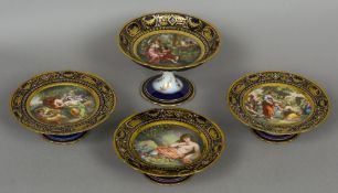 Four hand painted Royal Vienna comports Each centrally painted with a classical scene with gilt