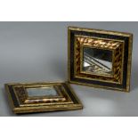 A pair of 19th century cushion moulded mirrors Decorated with faux tortoiseshell designs.