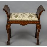 A 19th century Dutch marquetry piano stool With twin bowed arms flanking the drop in seat above the