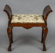 A 19th century Dutch marquetry piano stool With twin bowed arms flanking the drop in seat above the