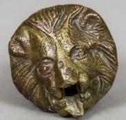 An antique Roman type bronze lion mask fountain head Of small proportions. 6.5 cm wide.