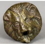An antique Roman type bronze lion mask fountain head Of small proportions. 6.5 cm wide.