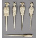 Five 19th century Napoleonic prisoner-of-war bone markers Four carved as various figures.