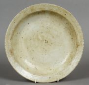 A Chinese porcelain shallow dish With all over white crackle glaze, blue painted mark to base.