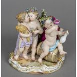 A 19th century Meissen porcelain figural group Modelled as Bacchanalian putto. 15 cm wide.