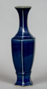 A Chinese porcelain vase Of hexagonal section with all over blue glaze,