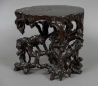 An early, possibly 17th or 18th century Chinese root wood stand Of naturalistic form,