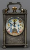 A small carriage clock The circular dial with Arabic numerals and Masonic motifs. 11 cm high.