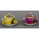 A pair of late 19th century Dresden covered cabinet cups and saucers Each piece painted with a