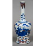 A Chinese blue and white porcelain vase Decorated with figures in a continuous garden with iron red