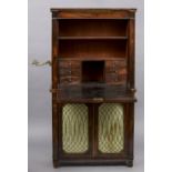 A 19th century rosewood secretaire The line inlaid fall enclosing a leather writing surface,