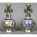A pair of late 19th/early 20th century Chinese Export silver and enamel twin handled vases Of