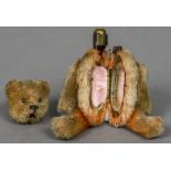 A late 19th/early 20th century miniature plush covered teddy bear form compact Of typical form,
