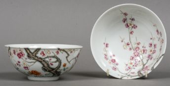 A pair of Chinese porcelain bowls Each externally and internally decorated with blossoming cherry