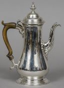 A George III silver coffee pot, hallmarked London 1762,