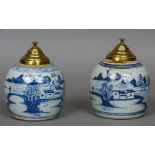 A pair of Chinese blue and white porcelain ginger jars Each decorated with a continuous river