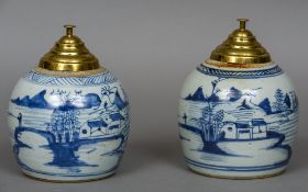 A pair of Chinese blue and white porcelain ginger jars Each decorated with a continuous river