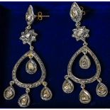A pair of rough cut diamond drop earrings Set in silver. Each 7.5 cm long.