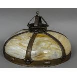 A Tiffany Arts & Crafts copper mounted mottled glass ceiling light The interior stamped Tiffany