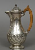 A Victorian silver coffee pot, hallmarked London 1895,