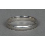 A platinum wedding band Sold with copy of original receipt.