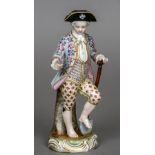 A Continental porcelain figure of a young gardener Blue painted crossed tridents mark to base.