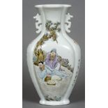 A Chinese porcelain twin handled vase Of lobed form, decorated with figures playing Go,