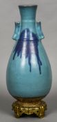 A 19th century Oriental turquoise ground vase Of spreading ovoid form,