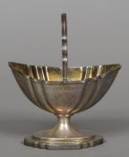 A William IV silver sugar basket, hallmarked London 1835,