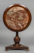 A 19th century marble top tilt-top tripod table The marble inset circular top above the spreading