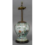 A 19th century Chinese famille verte porcelain vase Decorated with birds amongst foliage,