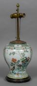 A 19th century Chinese famille verte porcelain vase Decorated with birds amongst foliage,