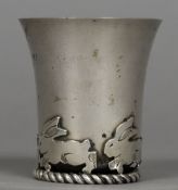 A French silver plated Christening beaker Of flared form, the base rim decorated with rabbits,