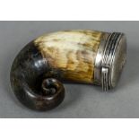 A Scottish unmarked white metal mounted horn snuff mull Of typical hinged form. 8 cm high.