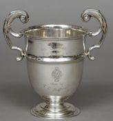 A Sterling silver twin handled trophy cup, hallmarked for Sterling Standard,