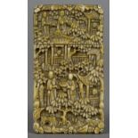 A small 19th century Cantonese carved ivory card case Typically decorated with figures amongst