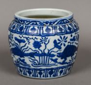 A Chinese blue and white porcelain vase Decorated with stylised fish amongst aquatic foliage. 17.