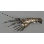 A Japanese white metal articulated model of a crayfish Naturalistically modelled,