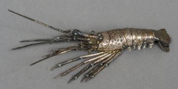 A Japanese white metal articulated model of a crayfish Naturalistically modelled,