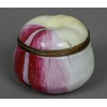 A 19th century enamelled apple form snuff box Of typical form. 4 cm high.
