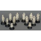 Twelve various late 19th/early 20th century Indian ivory figures Each mounted on an ebonised