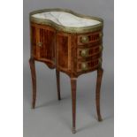 A 19th century French marble topped kidney shaped side table The brass galleried top above three