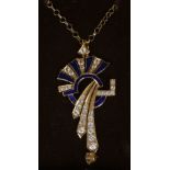 An unmarked 18 ct gold enamel decorated pendant Mounted on a 9 ct gold chain. The pendant 5.