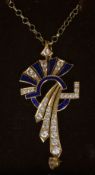 An unmarked 18 ct gold enamel decorated pendant Mounted on a 9 ct gold chain. The pendant 5.