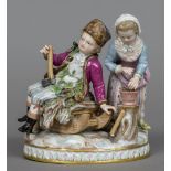 A 19th century Meissen porcelain figural group Formed as a woodsman and his wife. 13 cm wide.